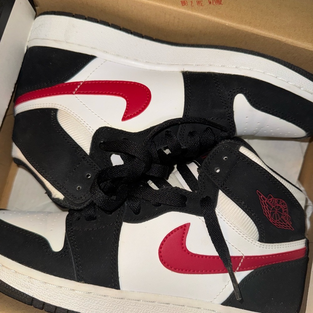 Jordan Black and White High-Top Sneakers